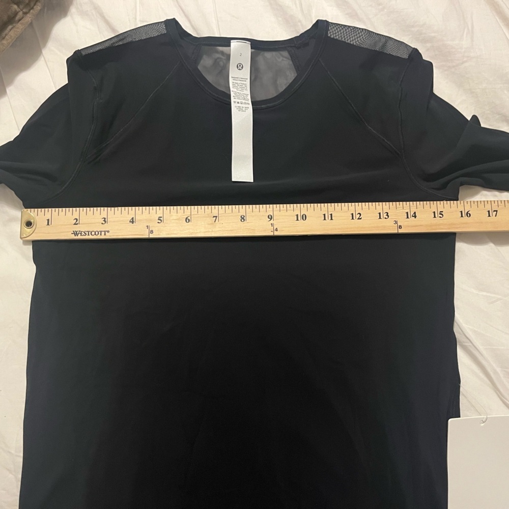 NWT Lululemon Size 2 Black Long Sleeve Athletic Top Pleated Back. Capsule Wear - Picture 9 of 10